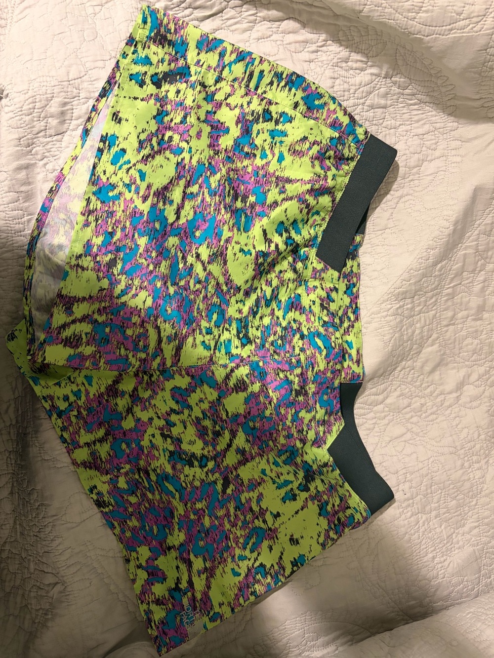 The North Face Women's Neon Green Athletic Shorts with Blue and Purple Print